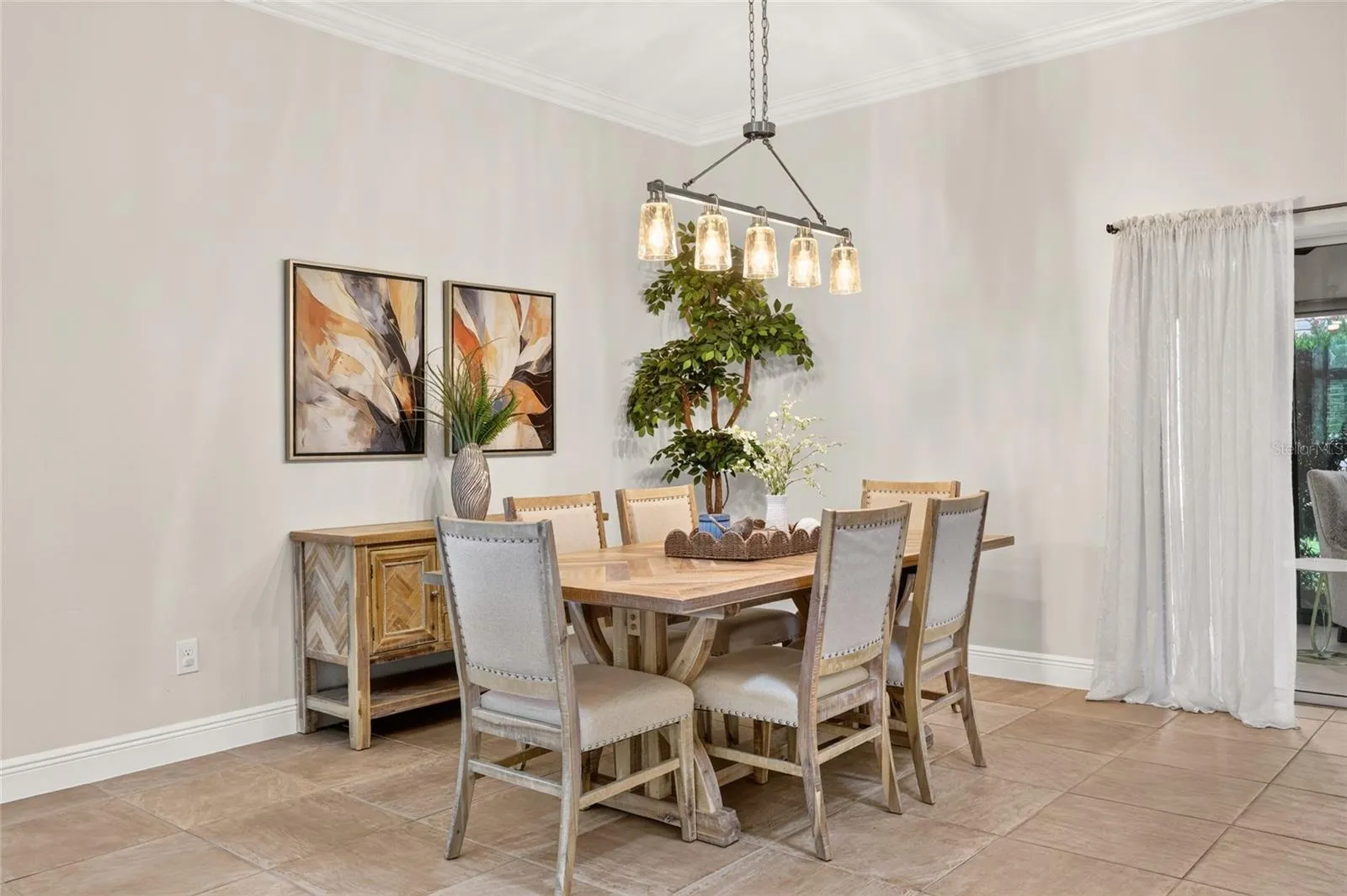 Spacious Dining Room with Crown Molding