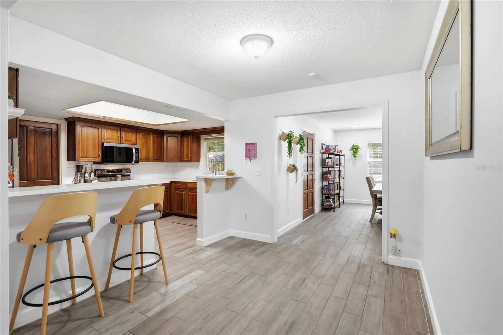 Connected living, kitchen, and dining spaces keep everyday life flowing.