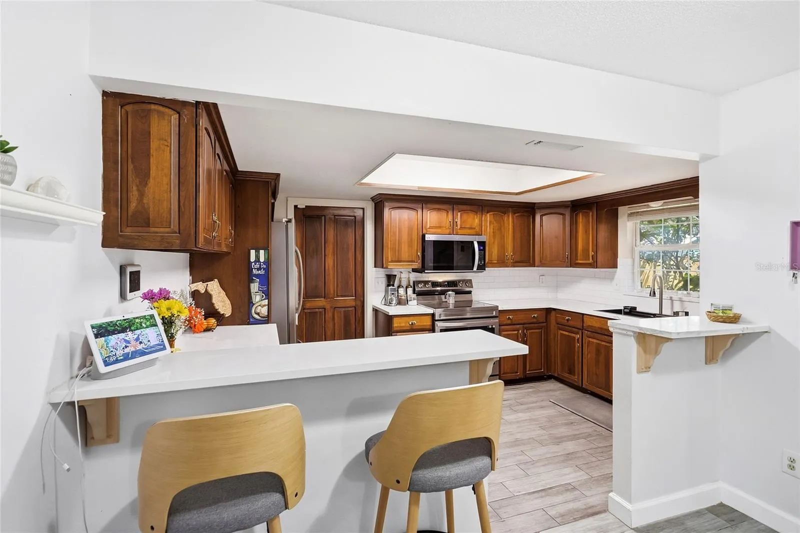 Pull up a seat at the kitchen breakfast bar and keep the conversation going.