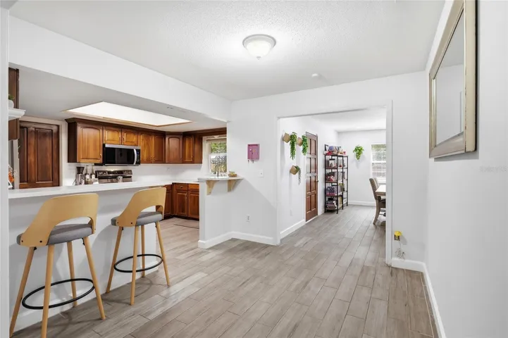 Connected living, kitchen, and dining spaces keep everyday life flowing.