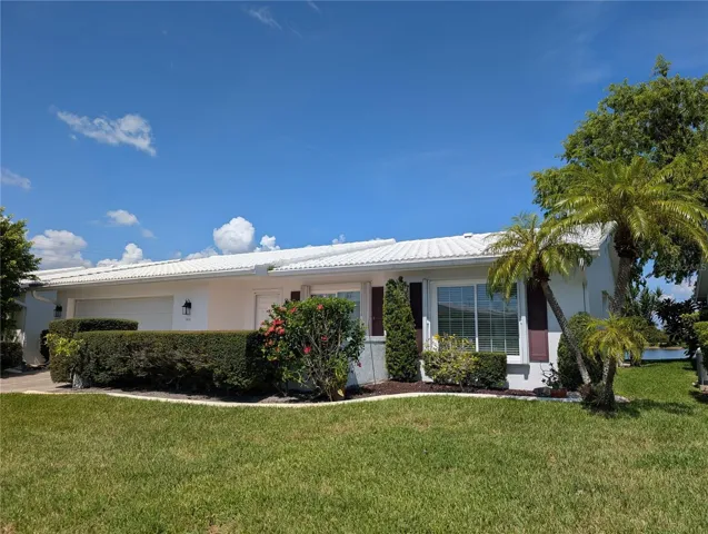 Water &amp; Golf Course view...2BR/2BA/2CG "Philodendron" home in +55 community, Mainlands of Tamarac, in "Heart of Tampa Bay."