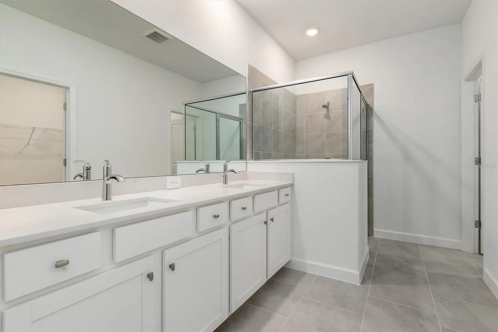Owner's suite bath - double sink, walk-in shower &amp; private water closet