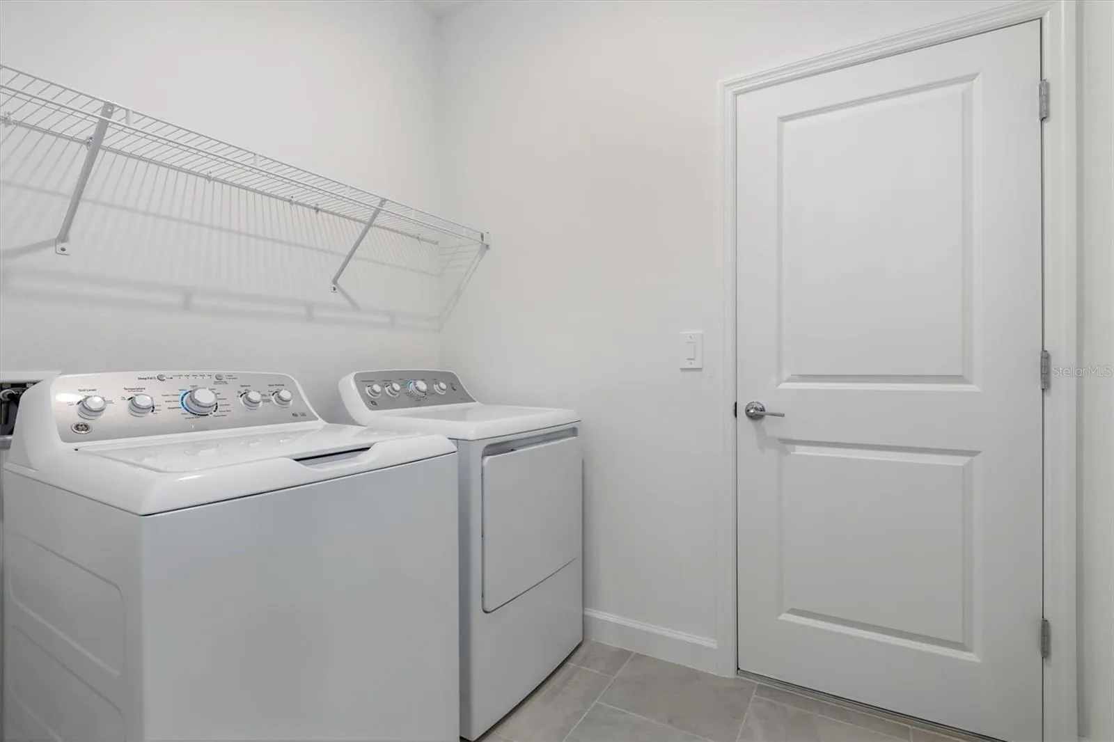 Laundry room and access to the 2 car garage