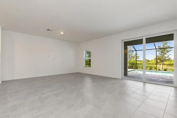 Living area access to the lanai and pool