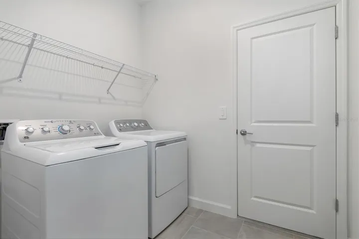 Laundry room and access to the 2 car garage