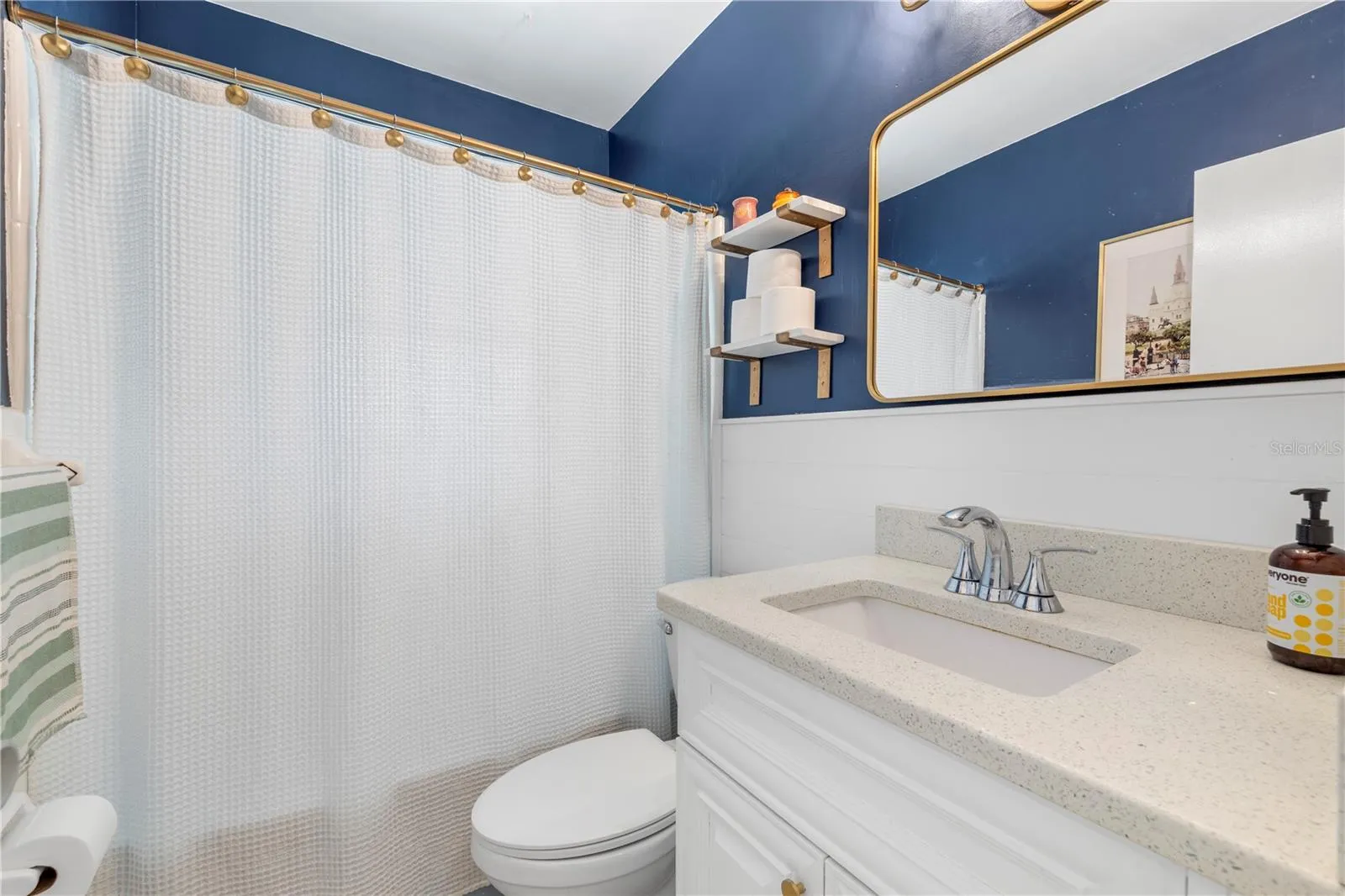 Full bathroom with a tub