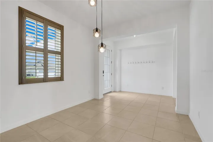 Dining room—or it could also be an office, playroom, or fourth bedroom.