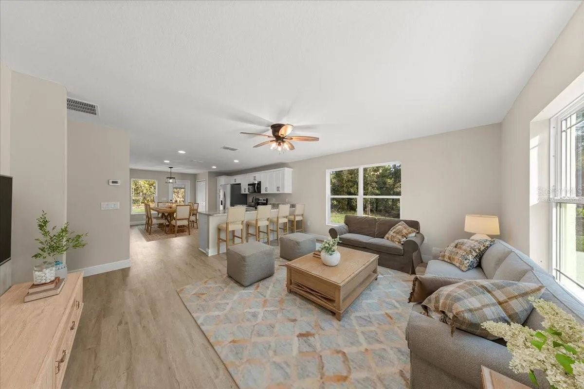 Virtually Staged. Stylish ceiling fans throughout