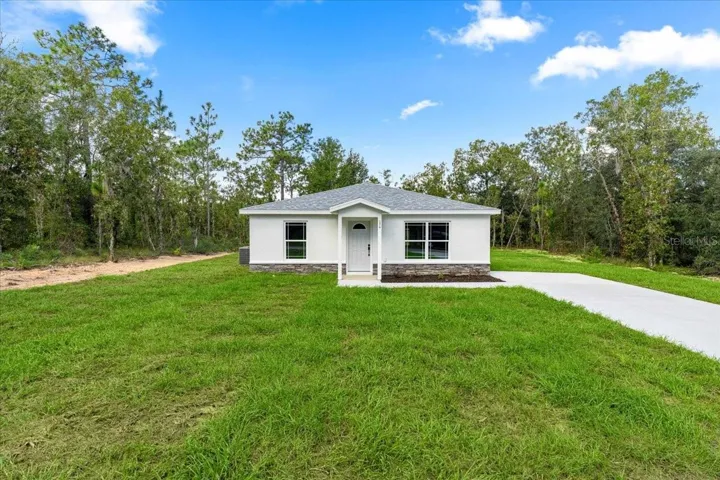 Front Exterior, surrounded by woods!