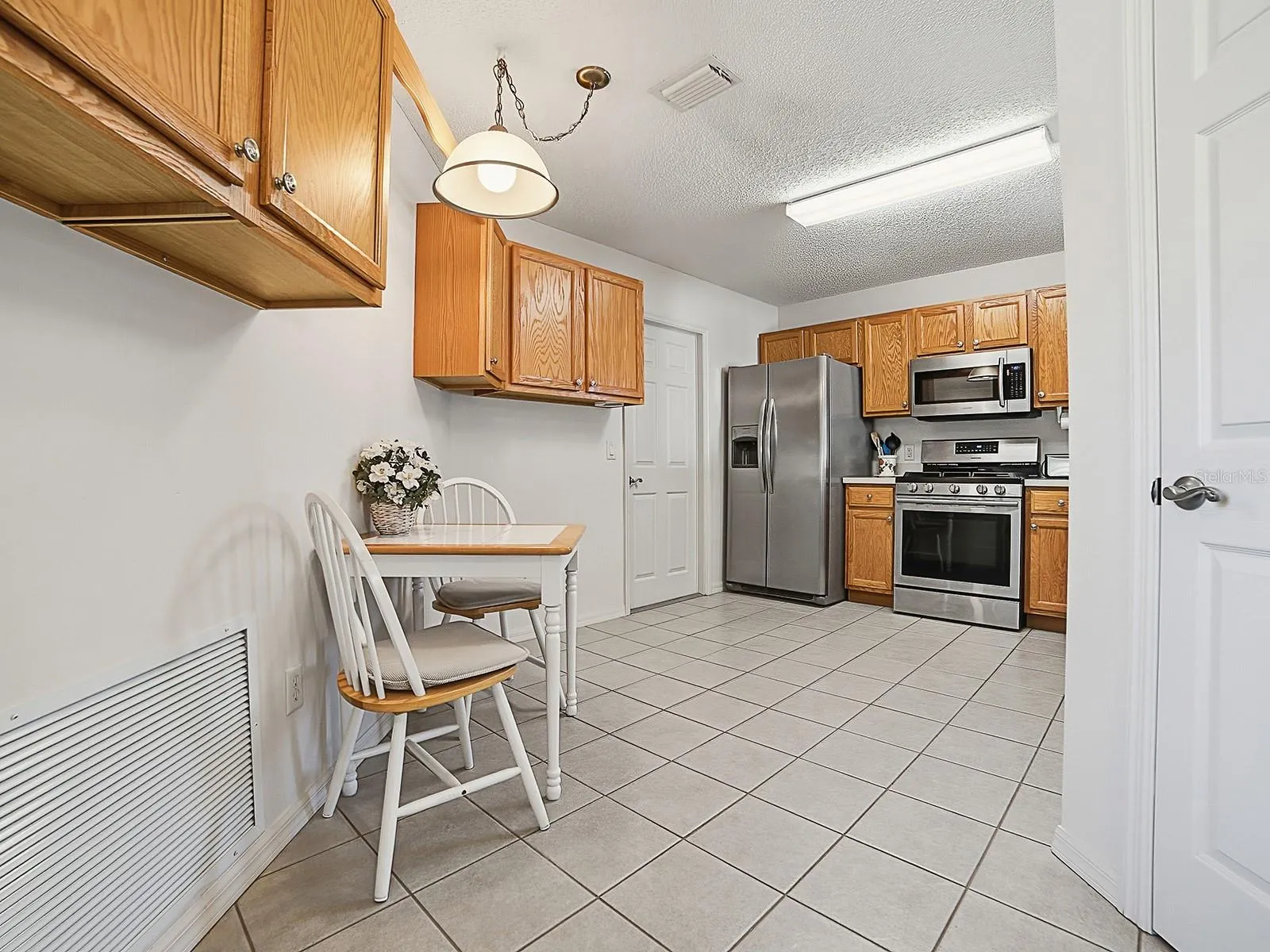 Plenty of cupboards and eat in kitchen
