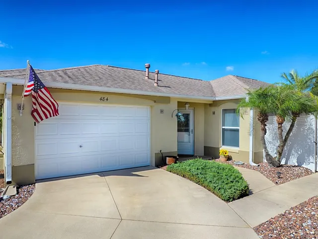 View of garage with the screen door up