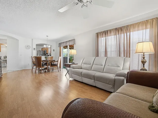 Main living area with view to dining and kitchen