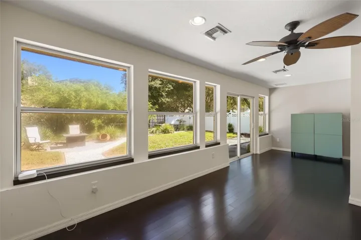 This room is off the living room, close to the kitchen, and can be used as a flex space!