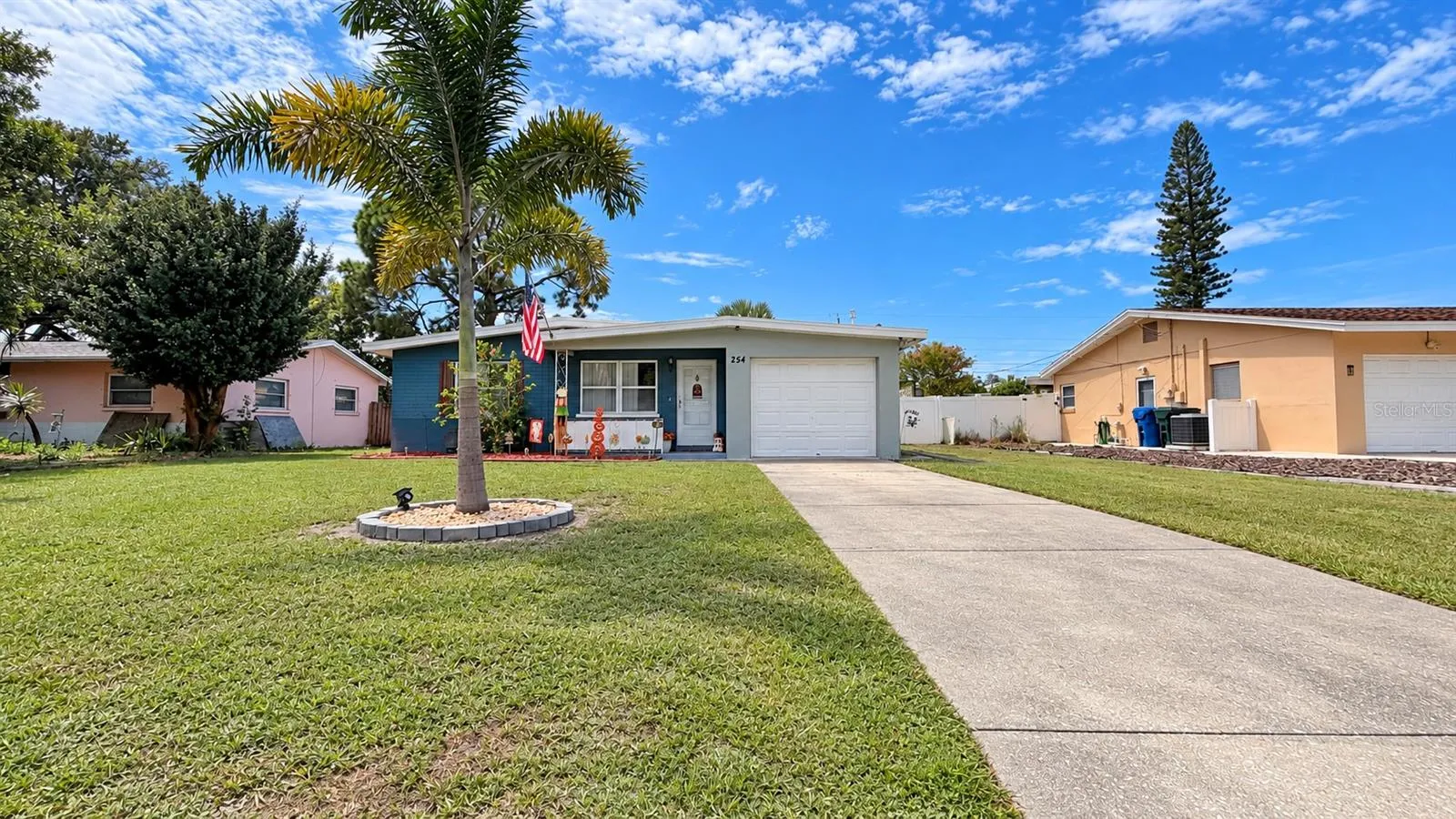 Front of home with long driveway