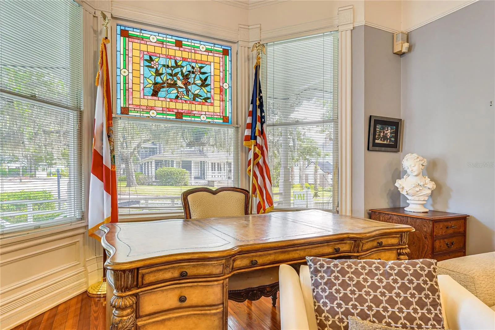 Living Room with Bay Window and Stained Glass