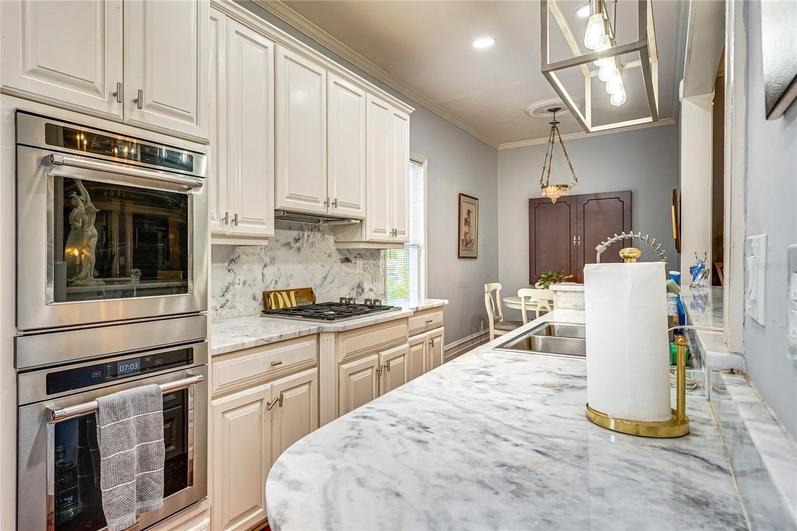 Kitchen with 1¼-Inch Granite Countertops and Double Ovens