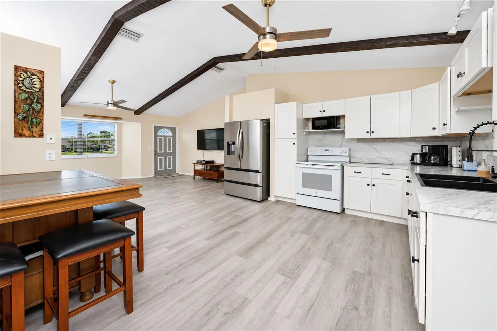 View of the dinette and kitchen.