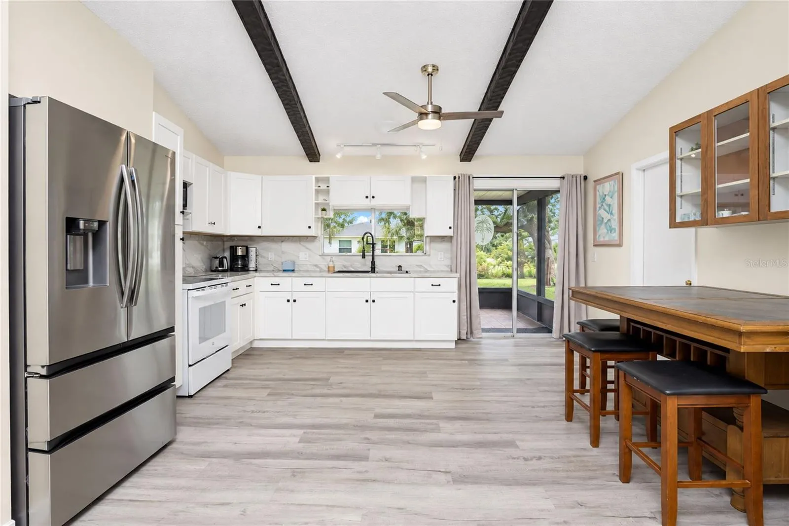 View of the dinette and kitchen.