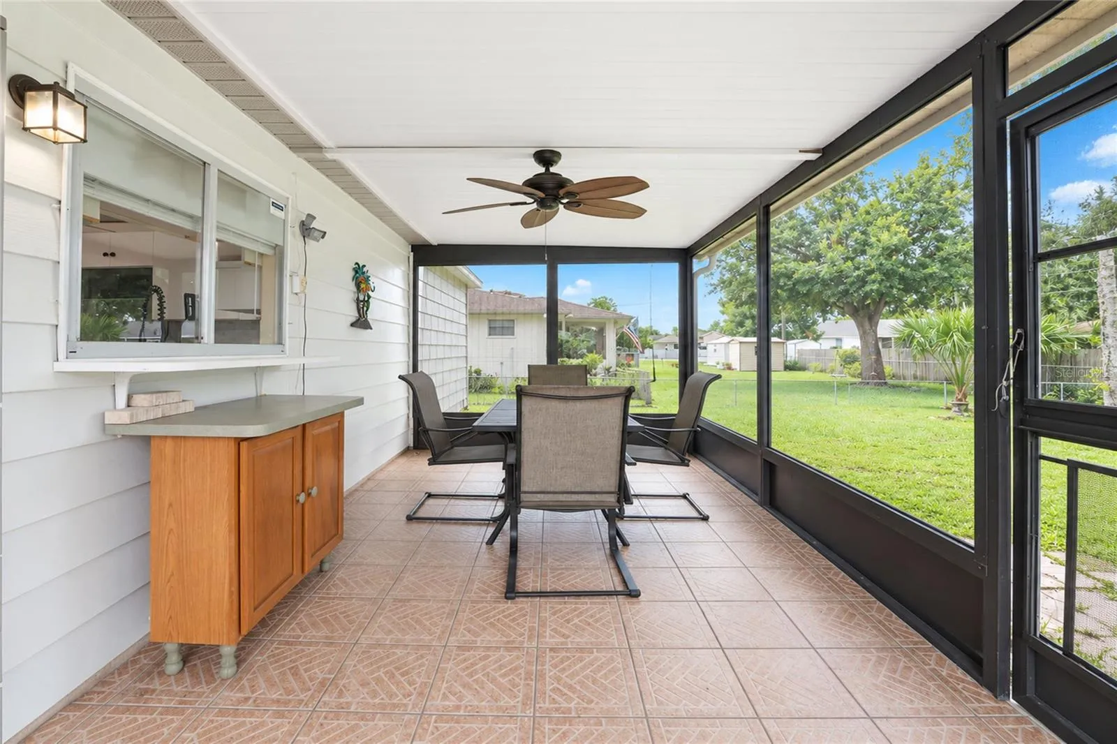 Screened porch.  Tiled floor.