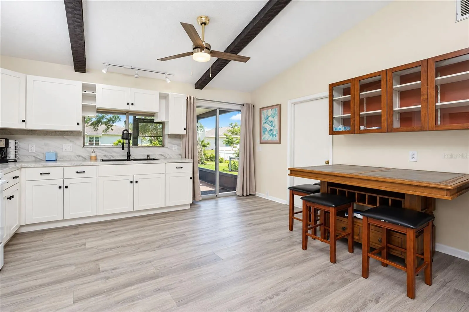 View of the dinette and kitchen.