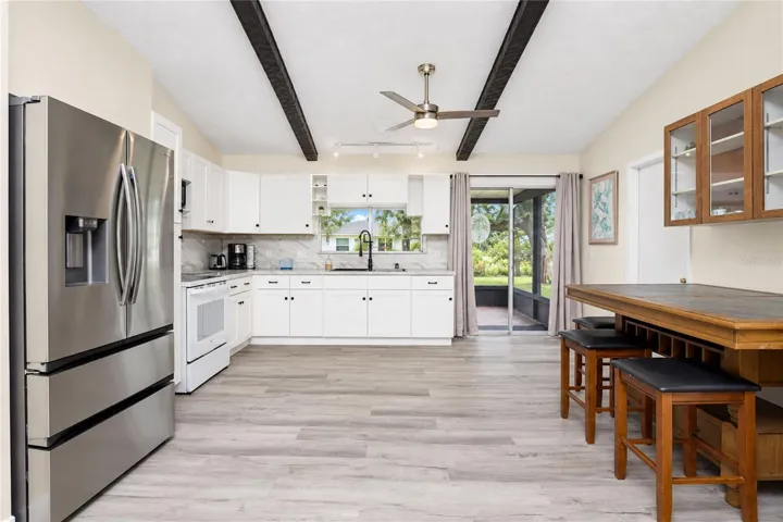 View of the dinette and kitchen.