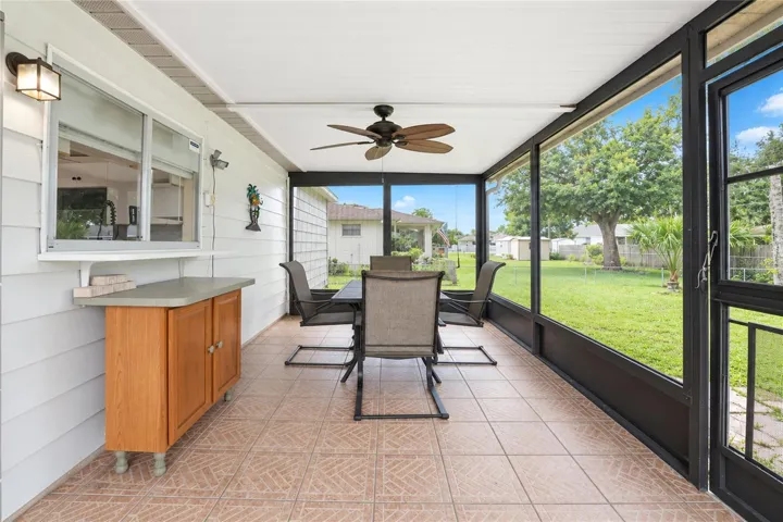 Screened porch.  Tiled floor.