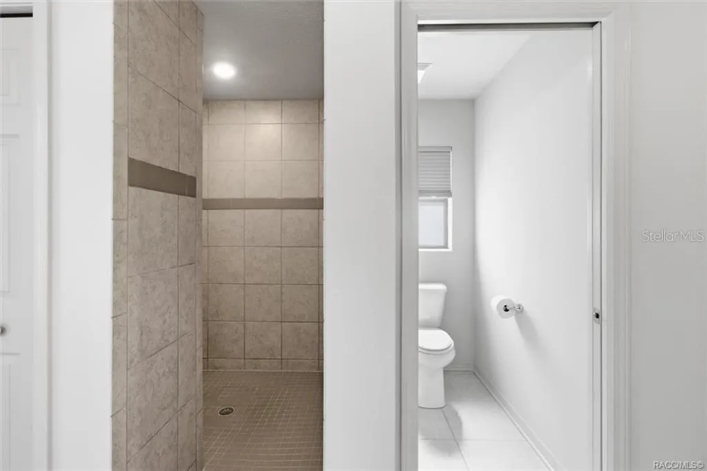 Master Bathroom w/ Private Water Closet &amp; Tiled Walk-in Shower