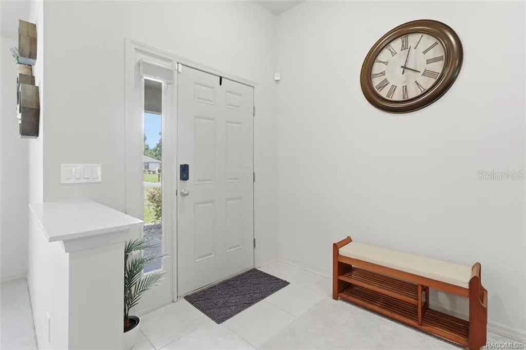 Tiled Foyer w/ Quartz Topped Half Wall