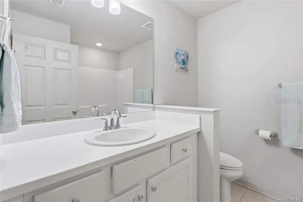 Bathroom 2 w White Vanity &amp; Quartz Top