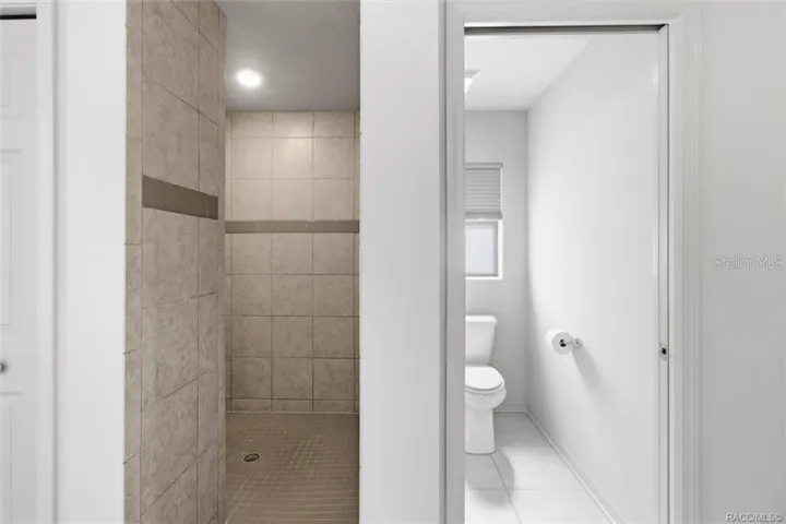 Master Bathroom w/ Private Water Closet &amp; Tiled Walk-in Shower