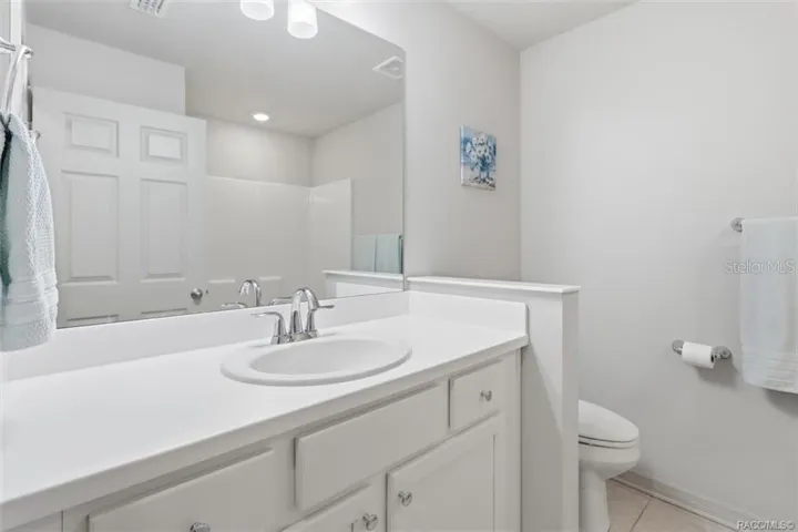 Bathroom 2 w White Vanity &amp; Quartz Top