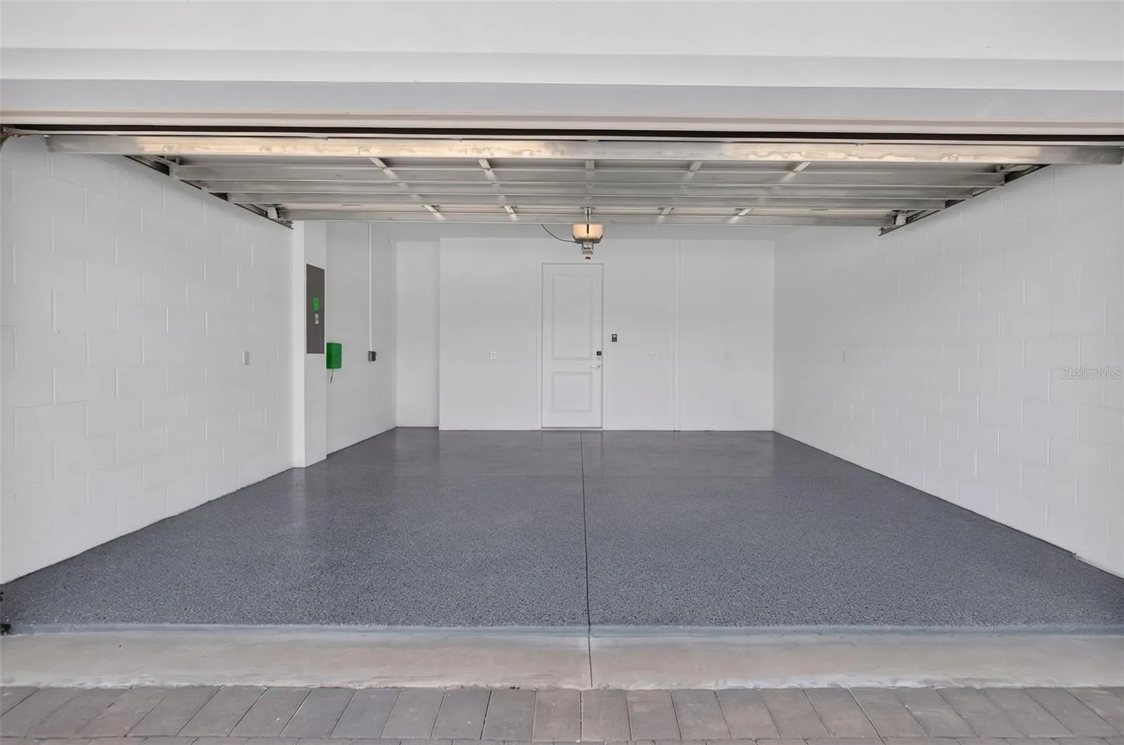 2 CAR GARAGE WITH EPOXY FLOORING/EV CHARGING
