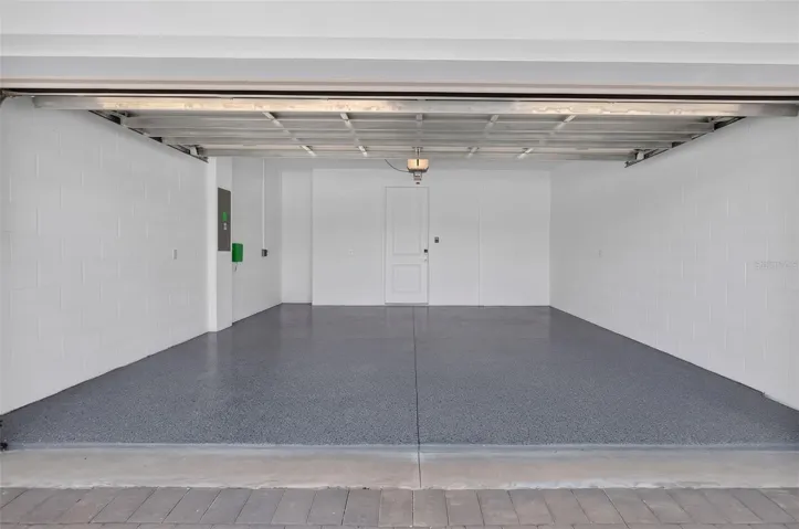 2 CAR GARAGE WITH EPOXY FLOORING/EV CHARGING