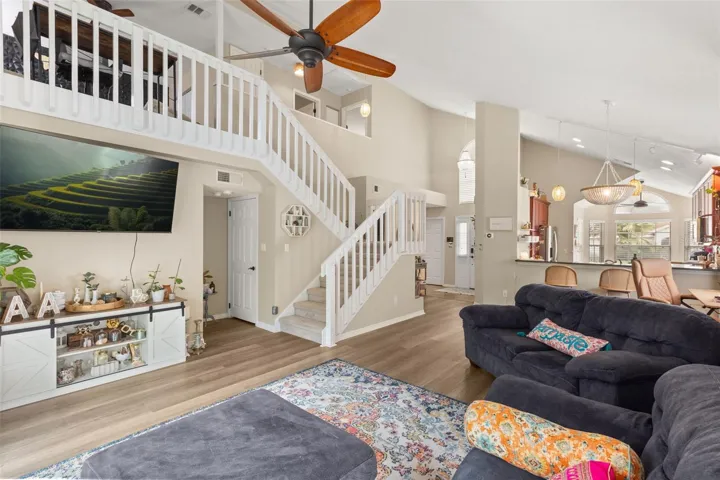 LIVING ROOM W/ LOFT VIEW