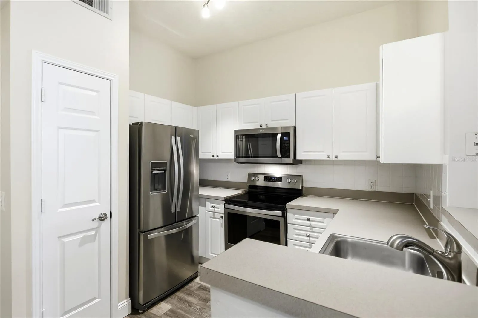 Stainless steel appliances in kitchen