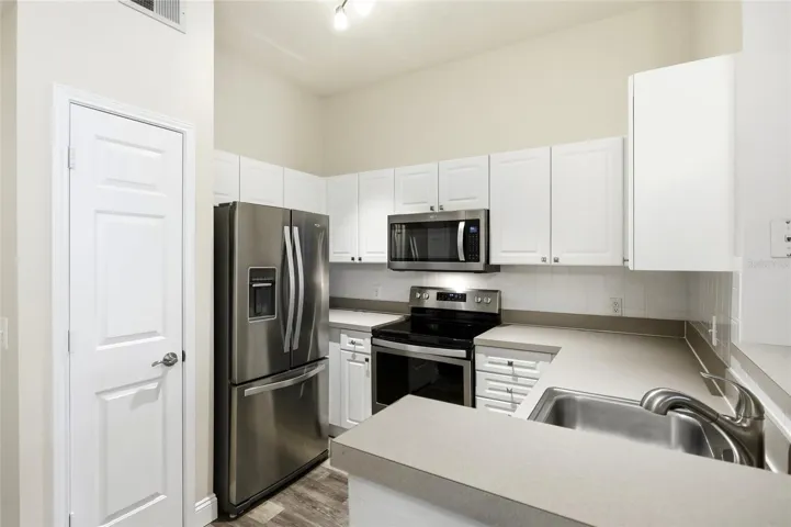 Stainless steel appliances in kitchen