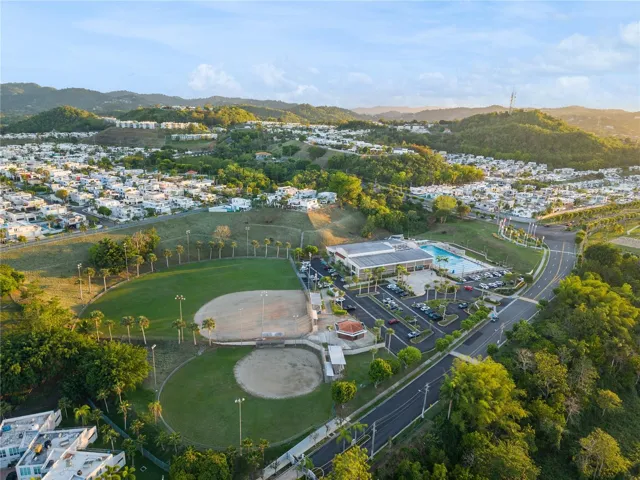 Everything your family needs without leaving the community: a large swimming pool, baseball and softball fields, tennis courts, and a full sports center