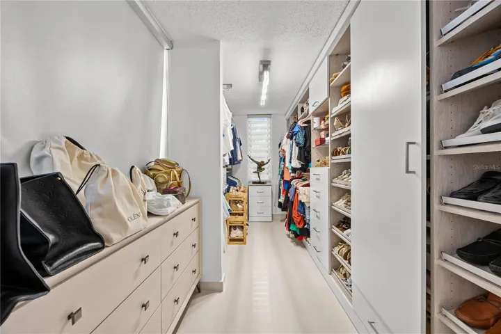 Completely renovated walk-in closet in the primary suite, a dressing room made for everyday ease