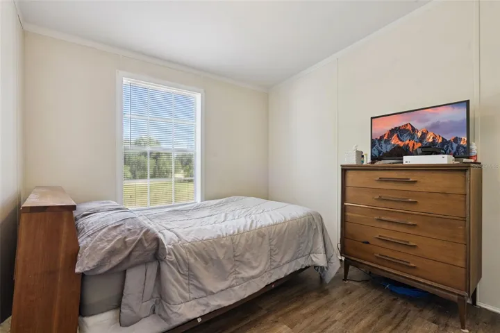 Bedroom #2 with vinyl plank flooring