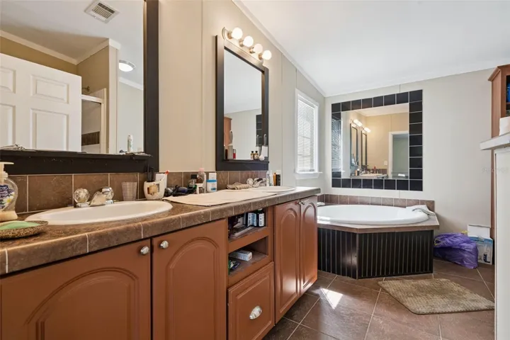 Primary Bath with comfort heigh vanity and dual sinks