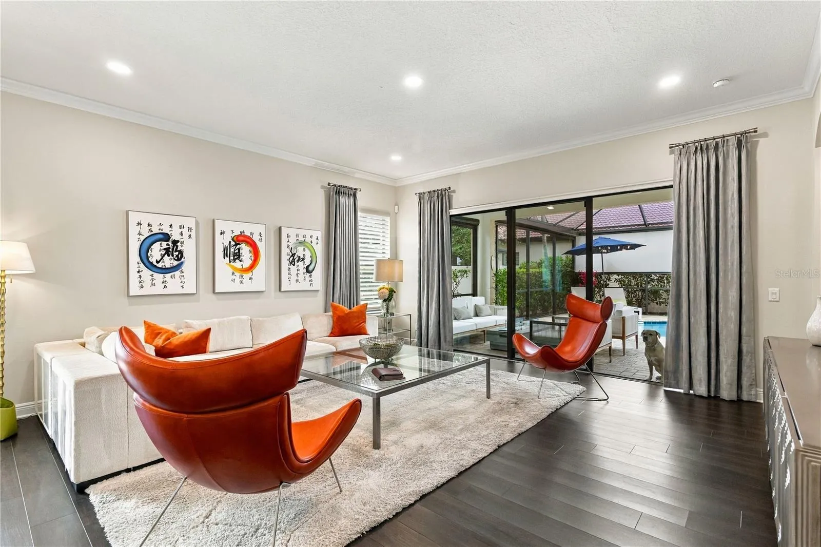 Living area with seating and sliding glass doors