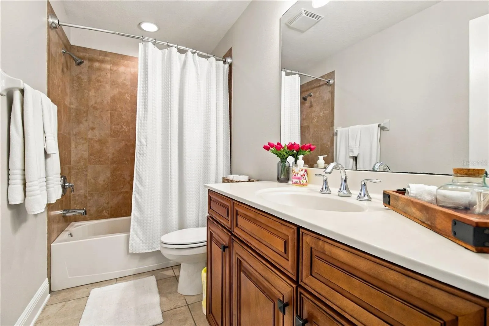 Bathroom vanity and glass shower