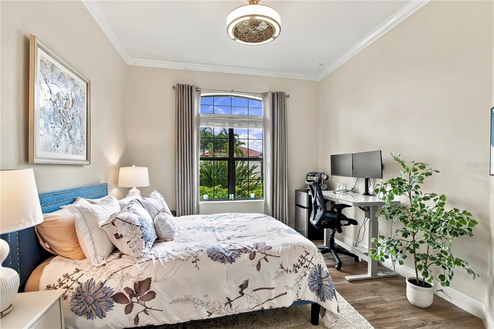 Bedroom with bed and windows