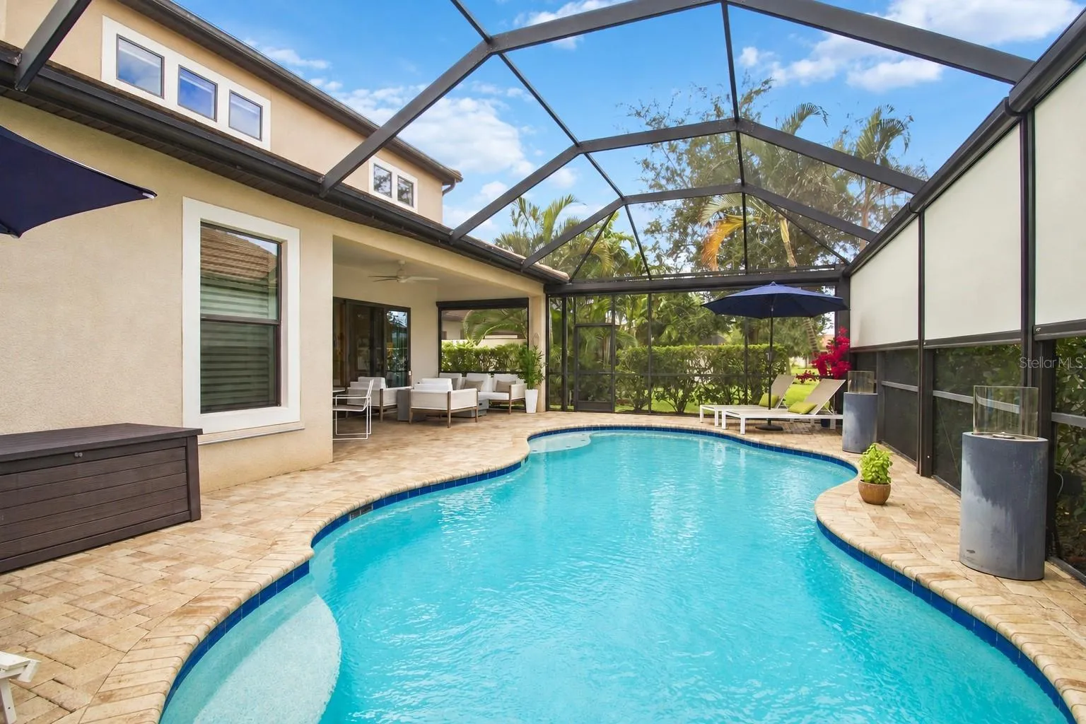 Pool and screened lanai from a second angle