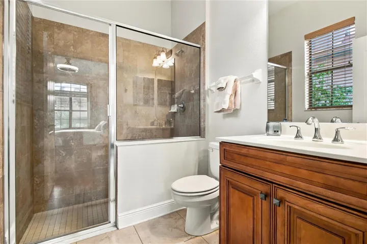 Bathroom vanity and glass shower