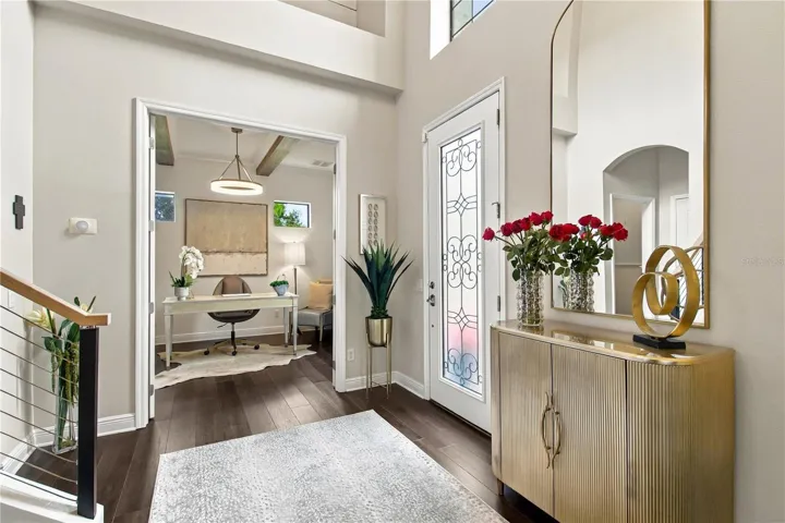 Foyer with console table and staircase