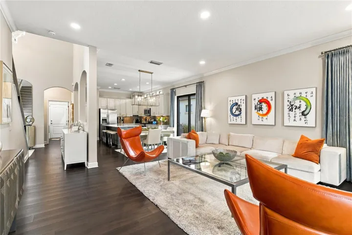 Living room with built-in shelving and accent seating