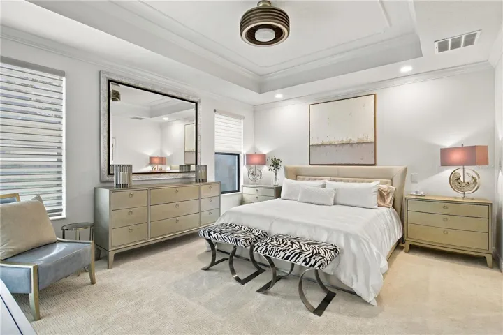 Bedroom with bed and adjoining bath
