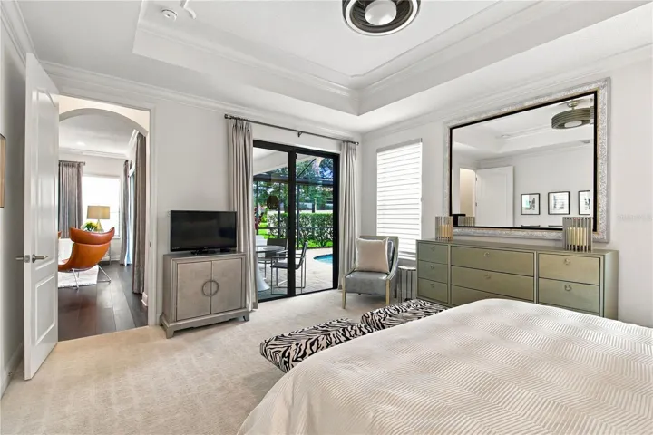 Bedroom with bed and doorway to adjoining space