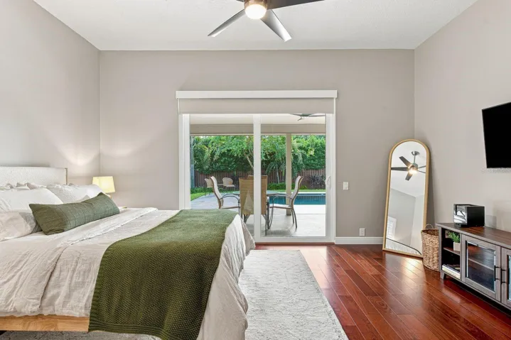 Primary bedroom, impact sliders to backyard